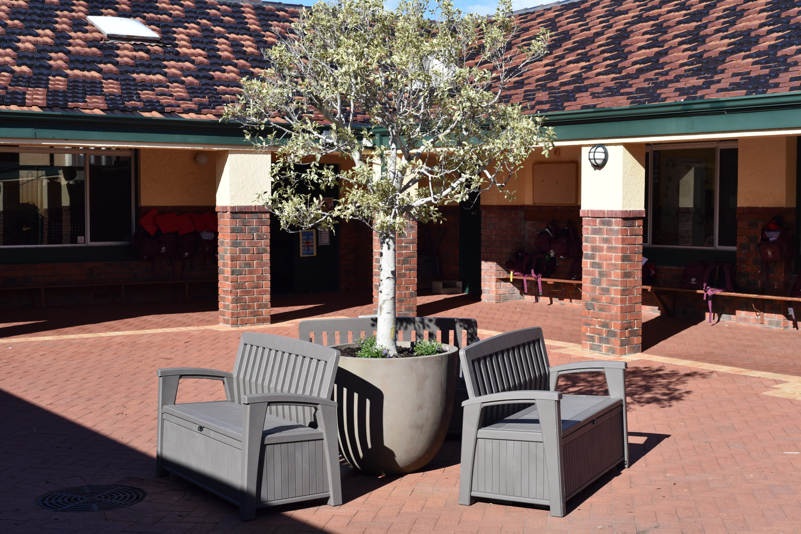 Courtyard Pot Damaged in Recent Storms