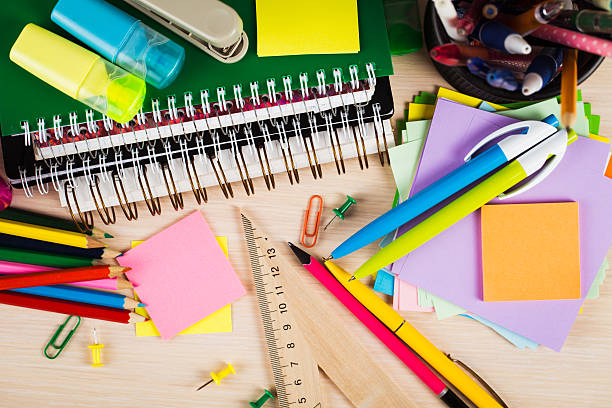School and office accessories on wooden background School and office accessories on wooden background